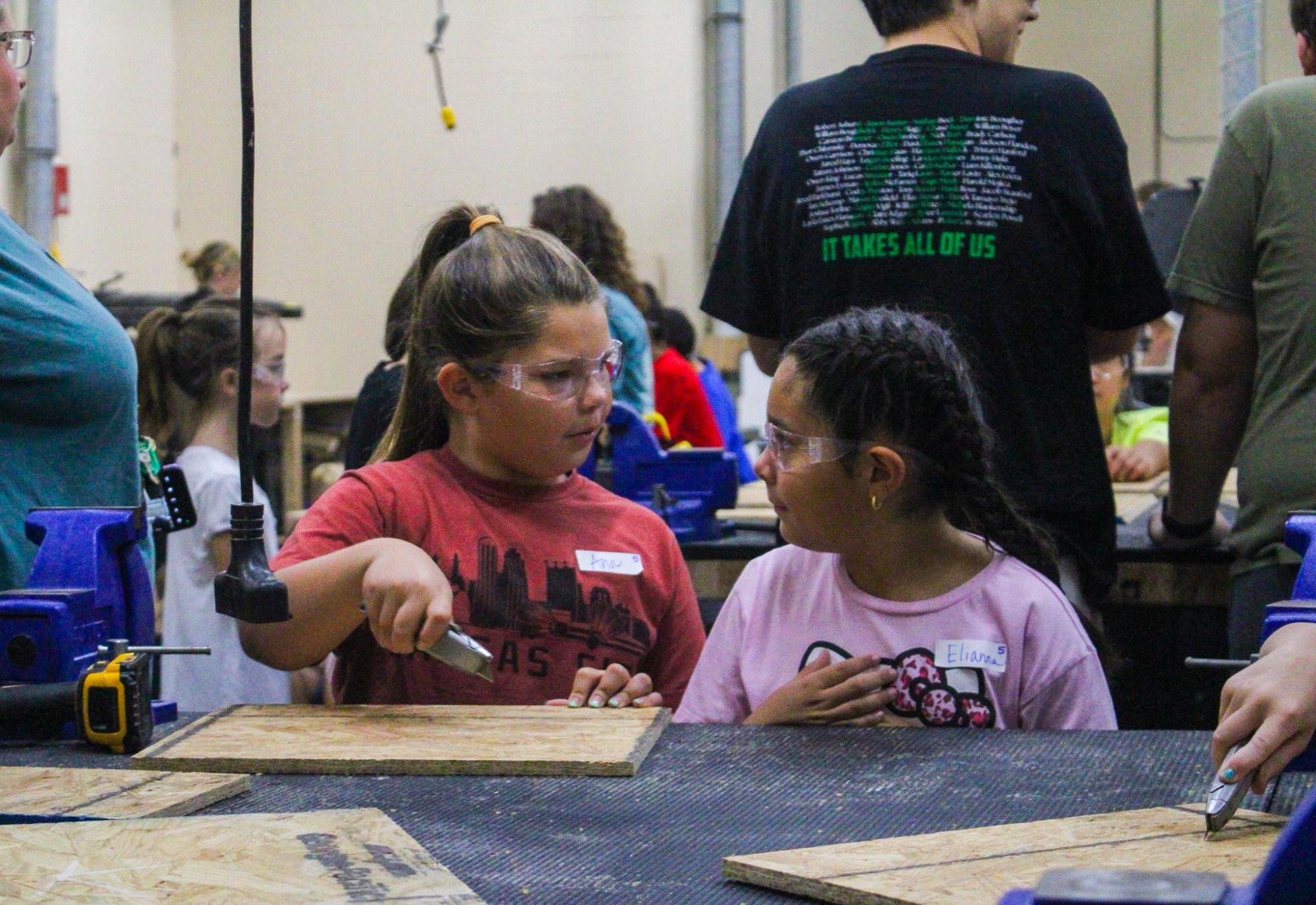 3rd grade students building Bat Houses (Photos By Ava Phouangmala)