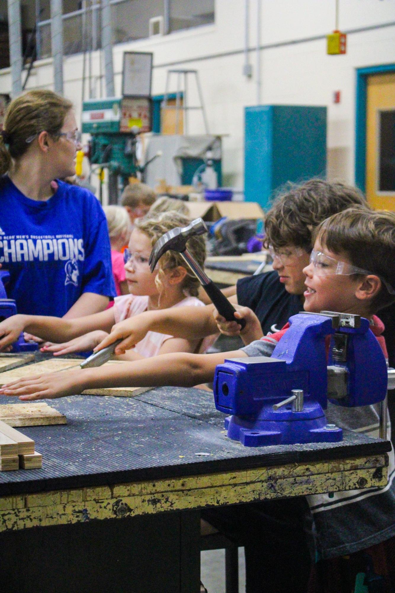 3rd grade students building Bat Houses (Photos By Ava Phouangmala)