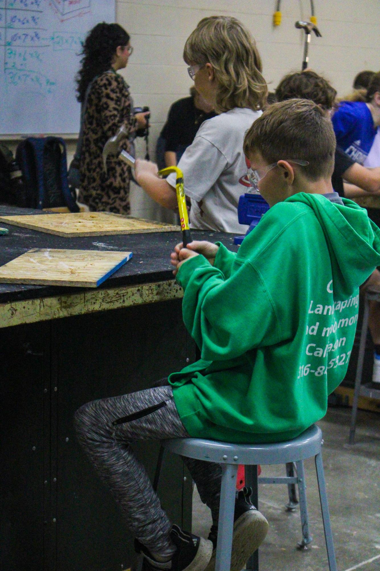 3rd grade students building Bat Houses (Photos By Ava Phouangmala)