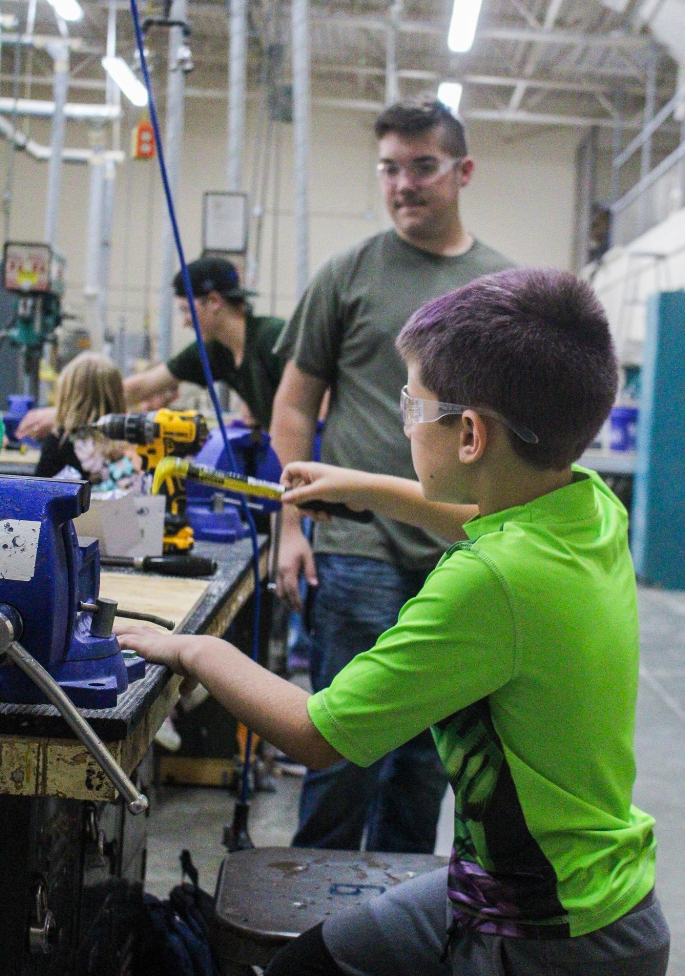3rd grade students building Bat Houses (Photos By Ava Phouangmala)