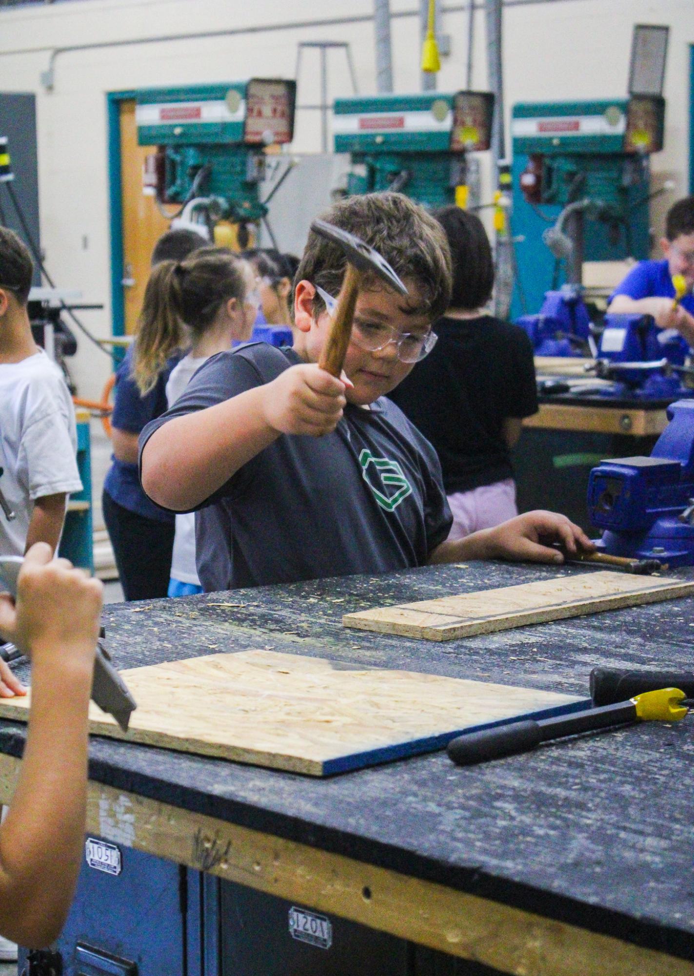 3rd grade students building Bat Houses (Photos By Ava Phouangmala)