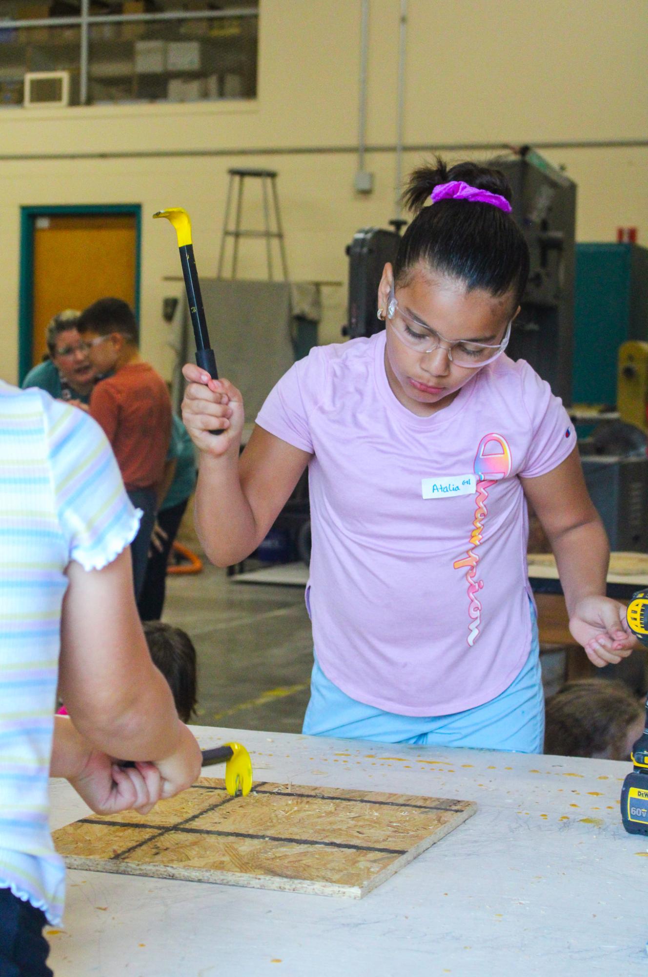 3rd grade students building Bat Houses (Photos By Ava Phouangmala)
