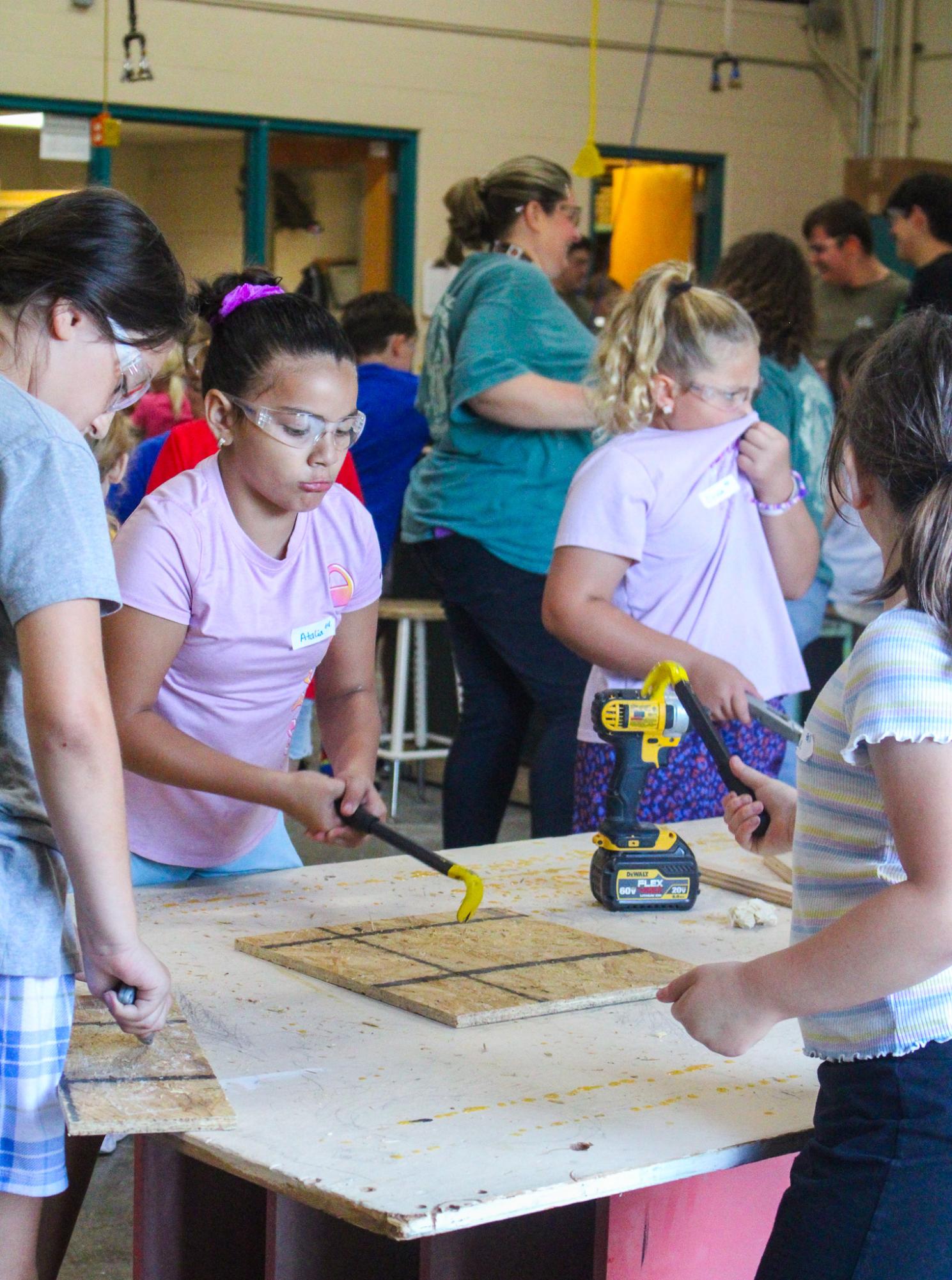3rd grade students building Bat Houses (Photos By Ava Phouangmala)