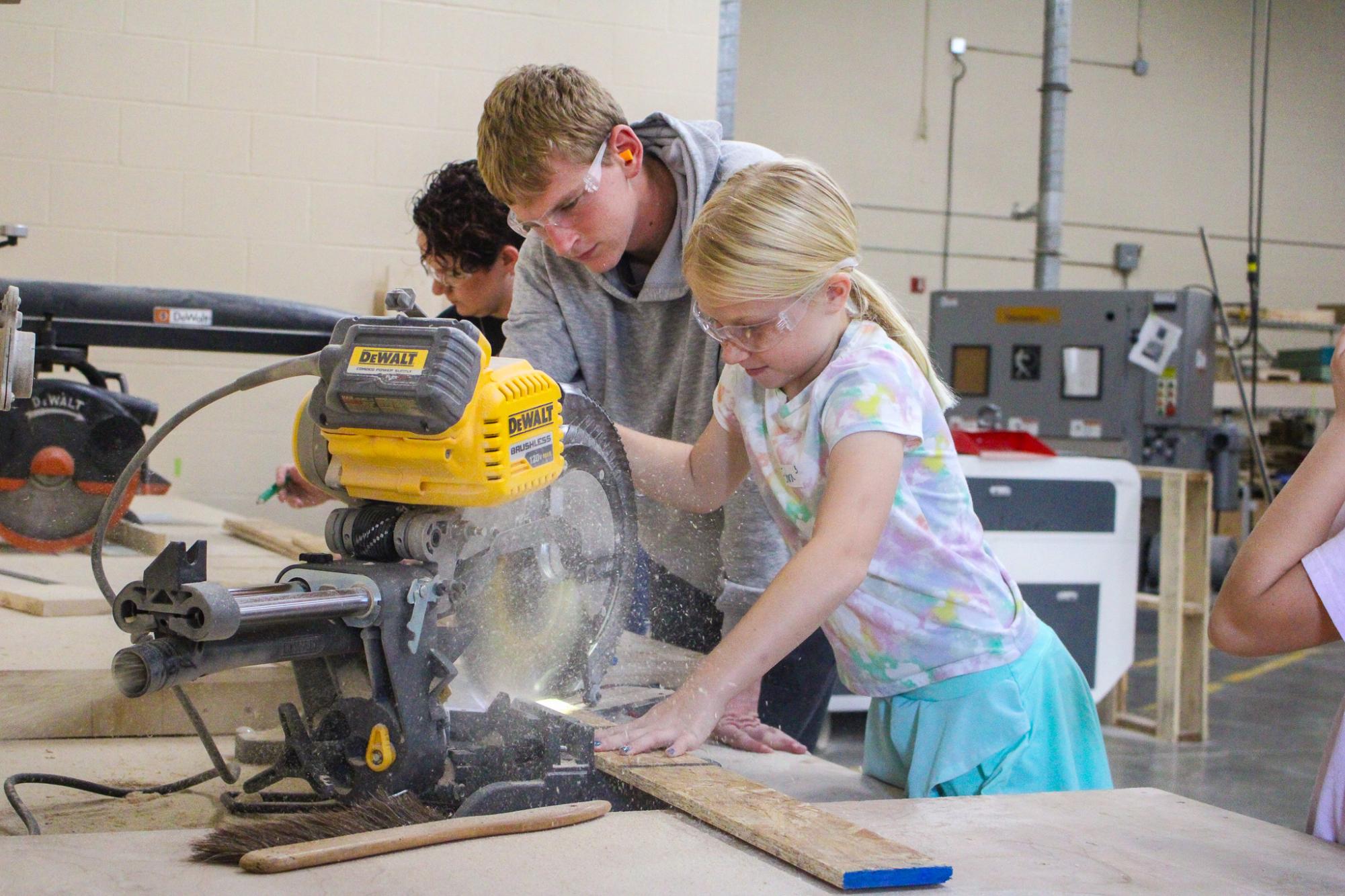 3rd grade students building Bat Houses (Photos By Ava Phouangmala)