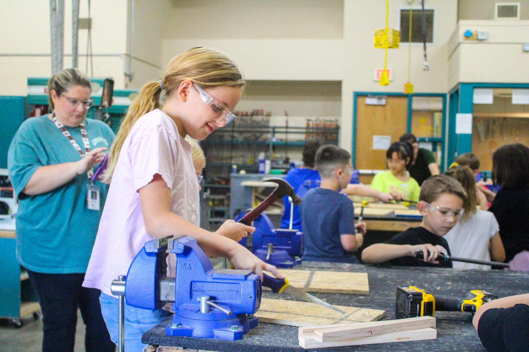 3rd grade students building Bat Houses (Photos By Ava Phouangmala)