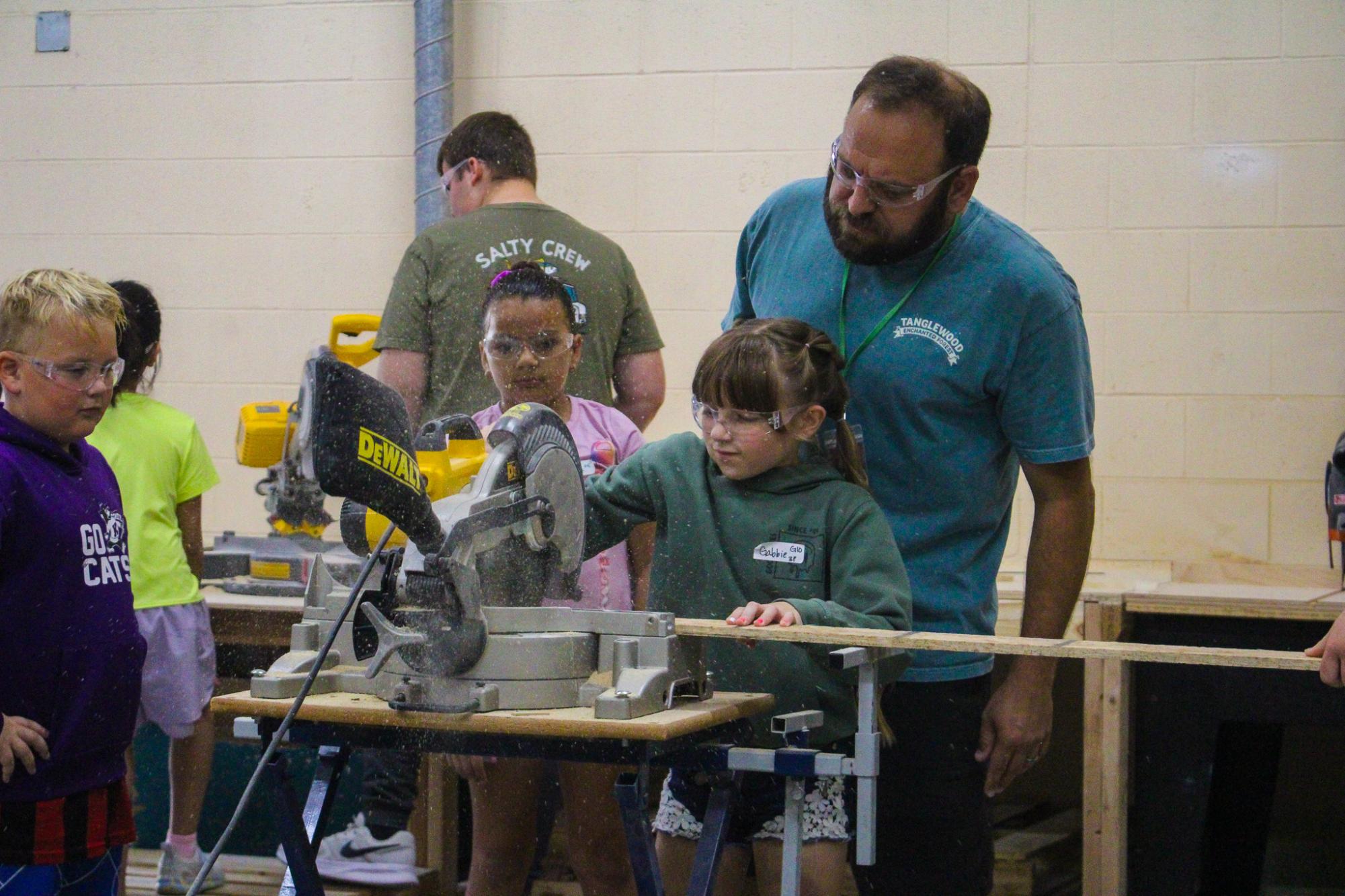 3rd grade students building Bat Houses (Photos By Ava Phouangmala)