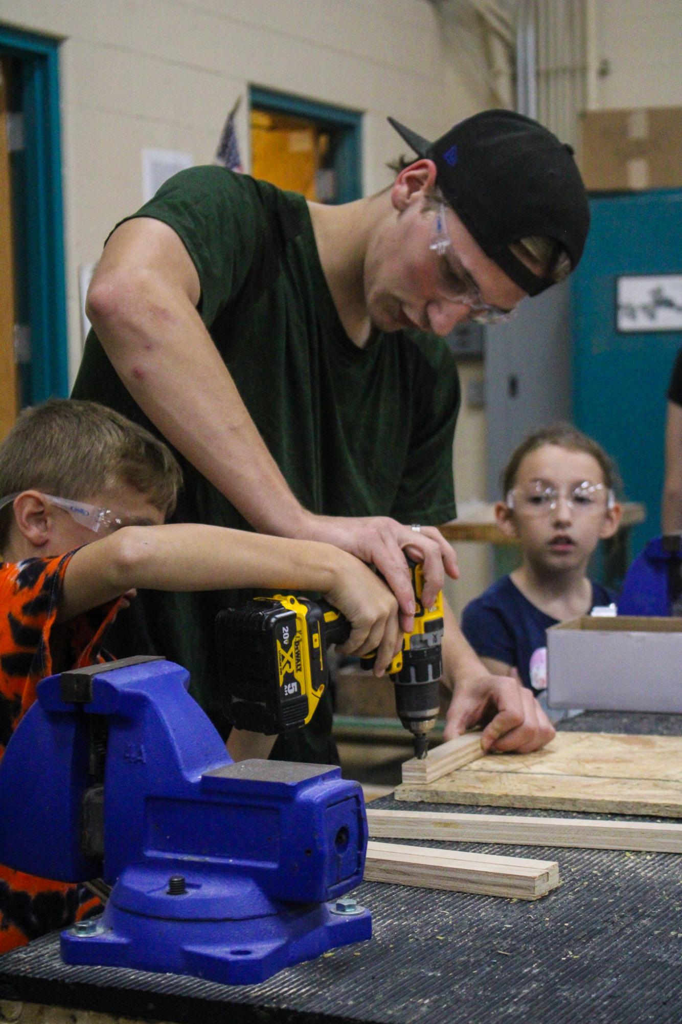 3rd grade students building Bat Houses (Photos By Ava Phouangmala)
