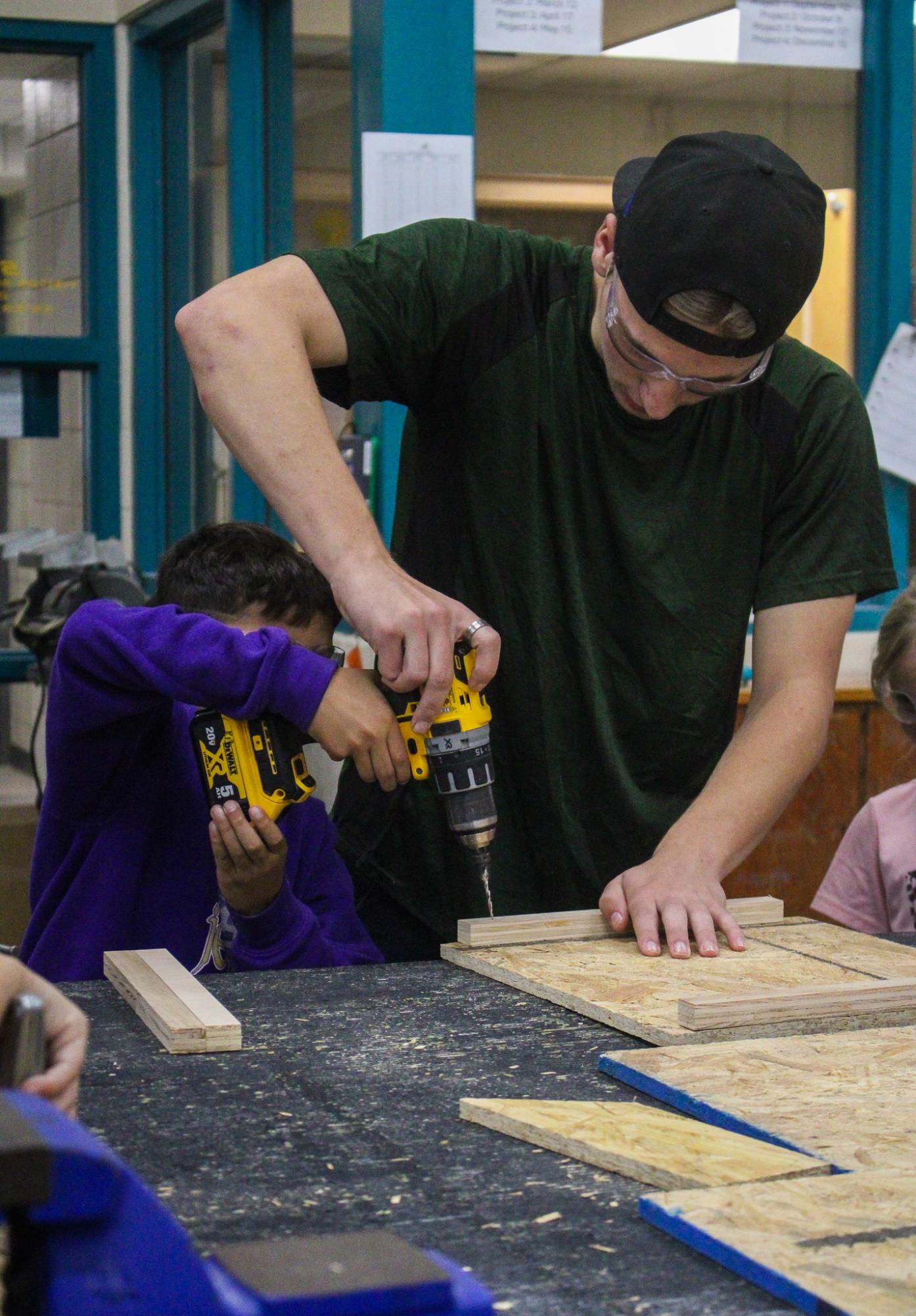 3rd grade students building Bat Houses (Photos By Ava Phouangmala)