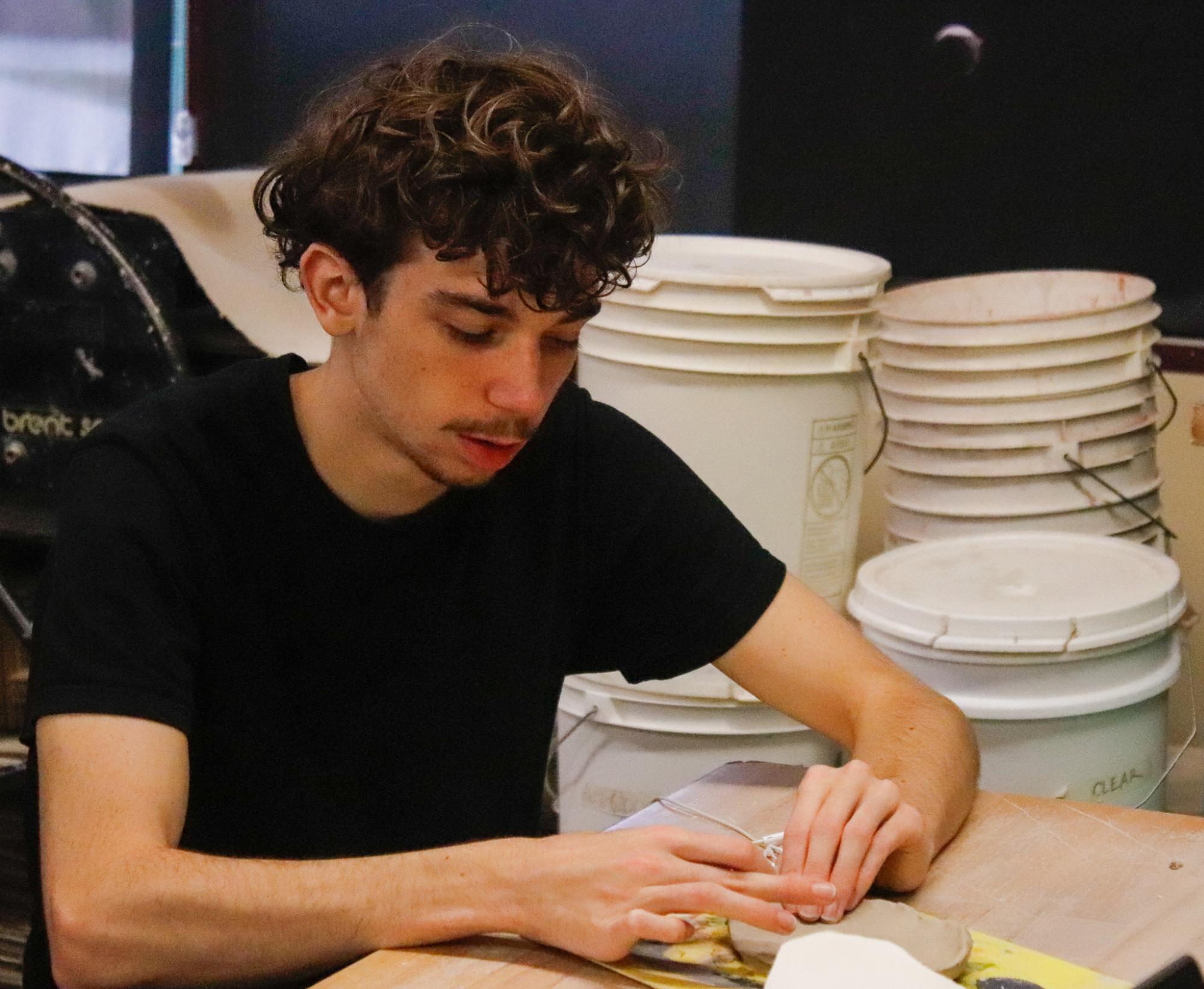 Working with clay (Photos by Janie Simard)