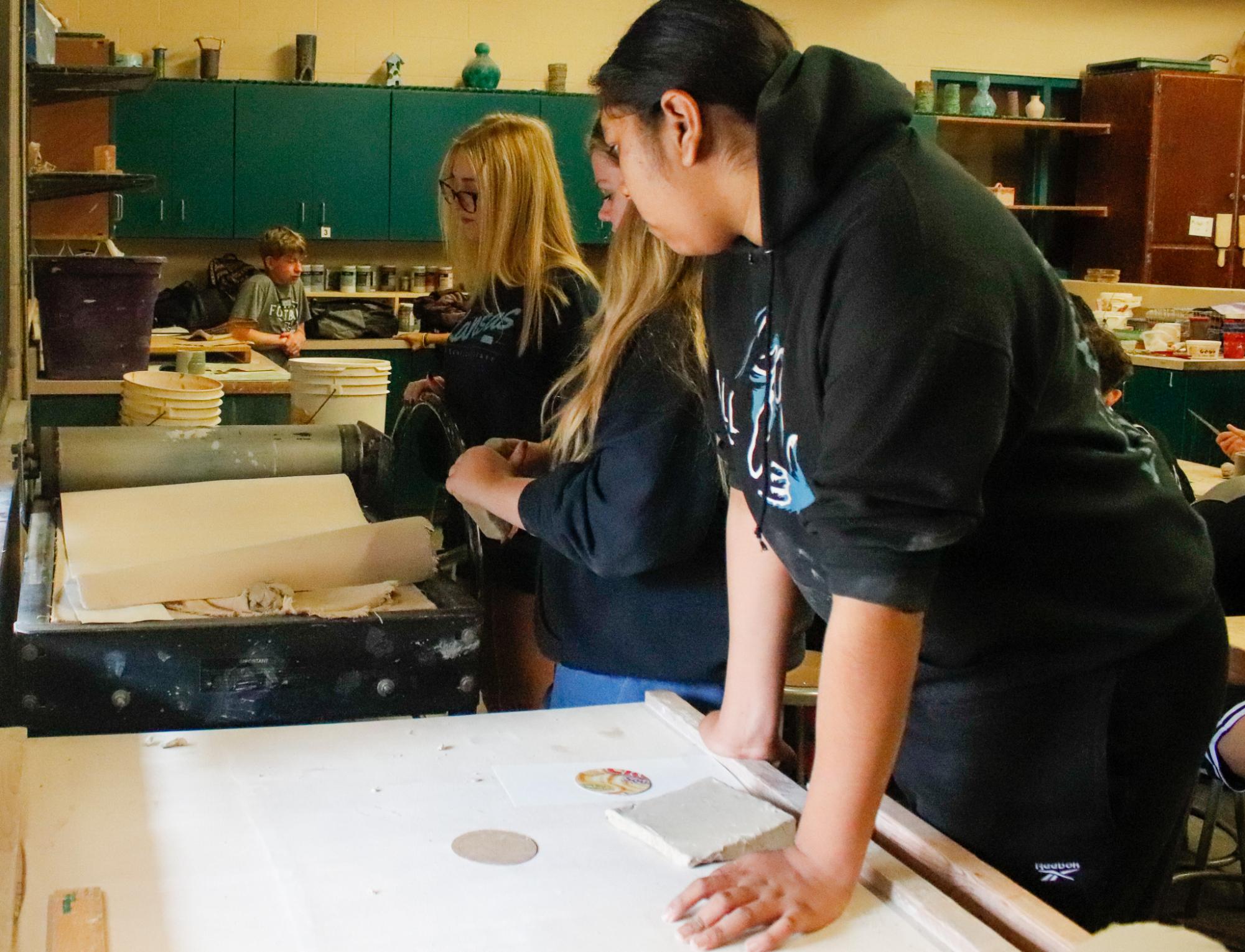 Working with clay (Photos by Janie Simard)