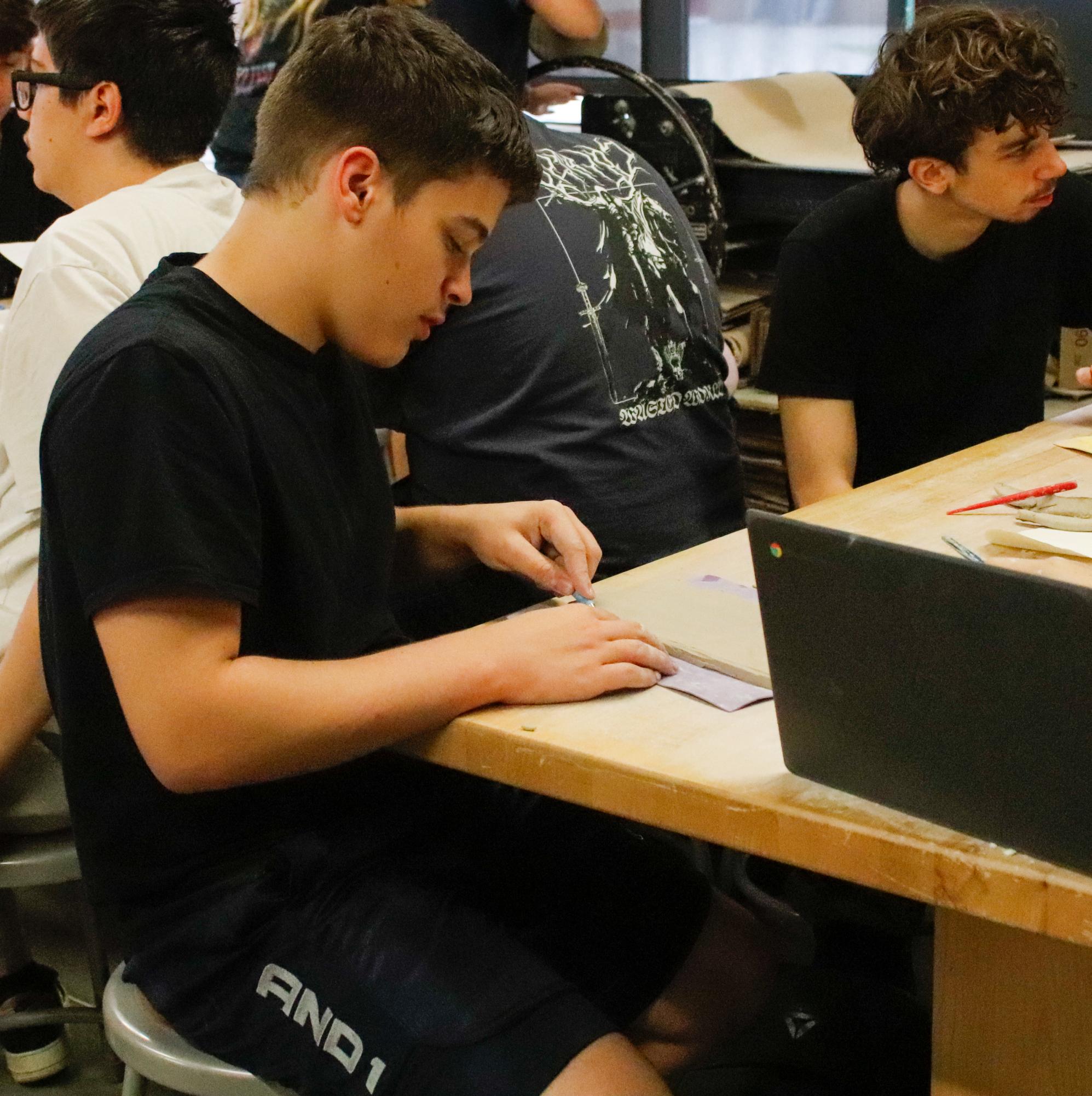 Working with clay (Photos by Janie Simard)