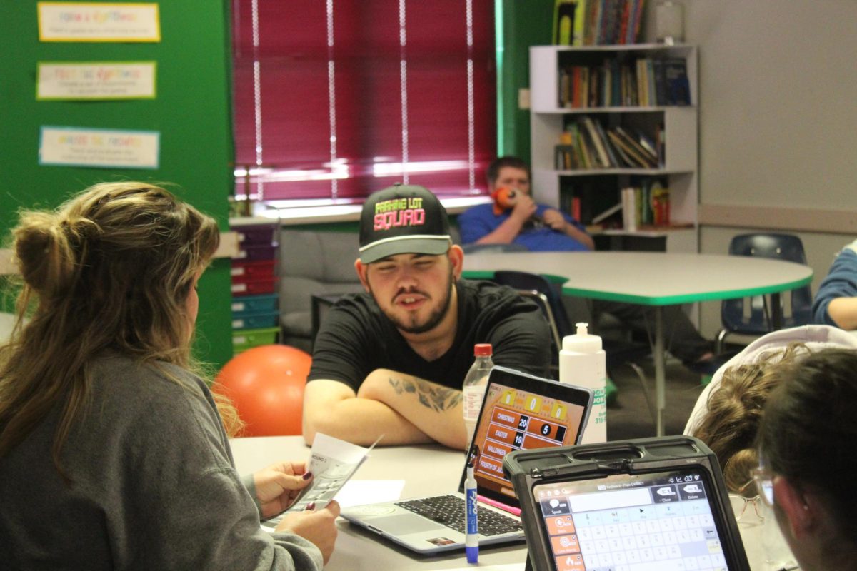 Student listens to question.