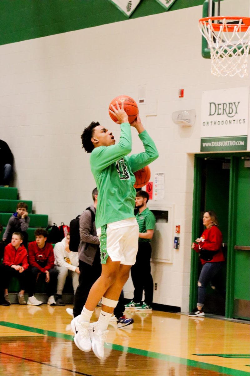 Sophomore Greg Stiger shoots the ball.