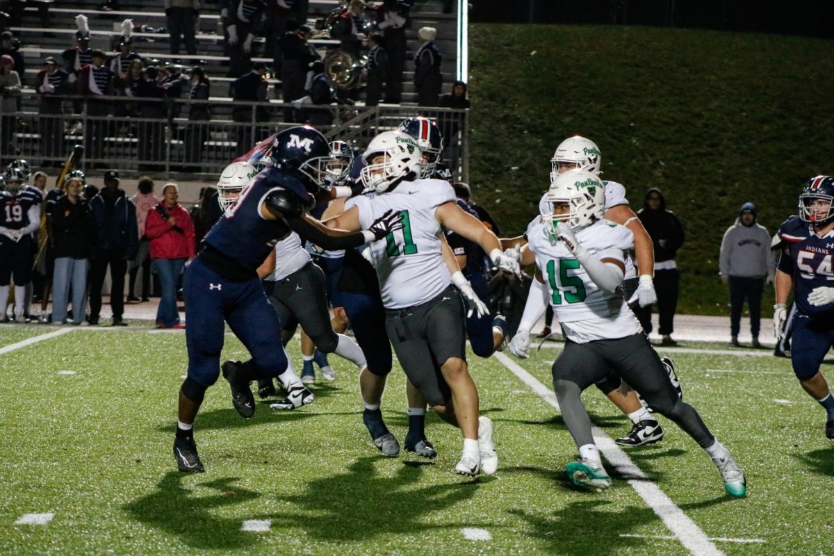 Players defend against opponents. 