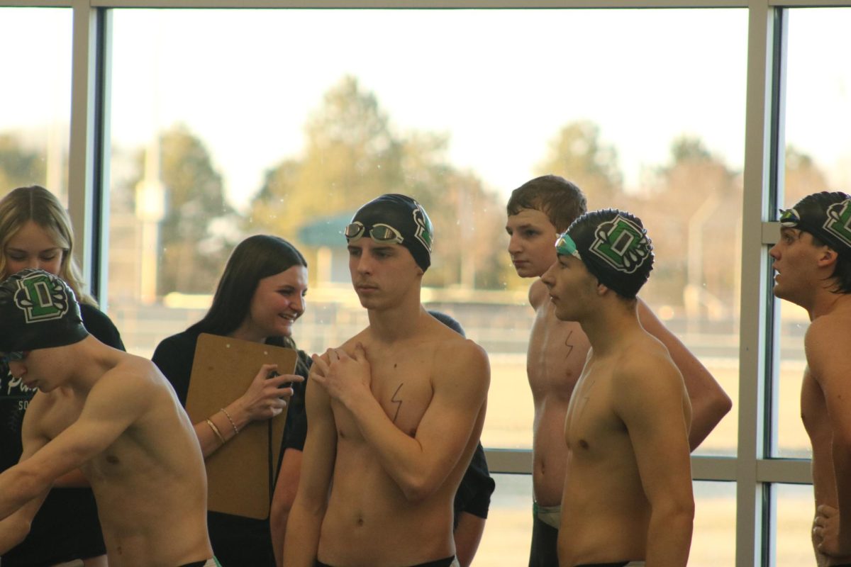 Senior Jackson Flanders preparing to swim (Photo by Sophia Rogers)