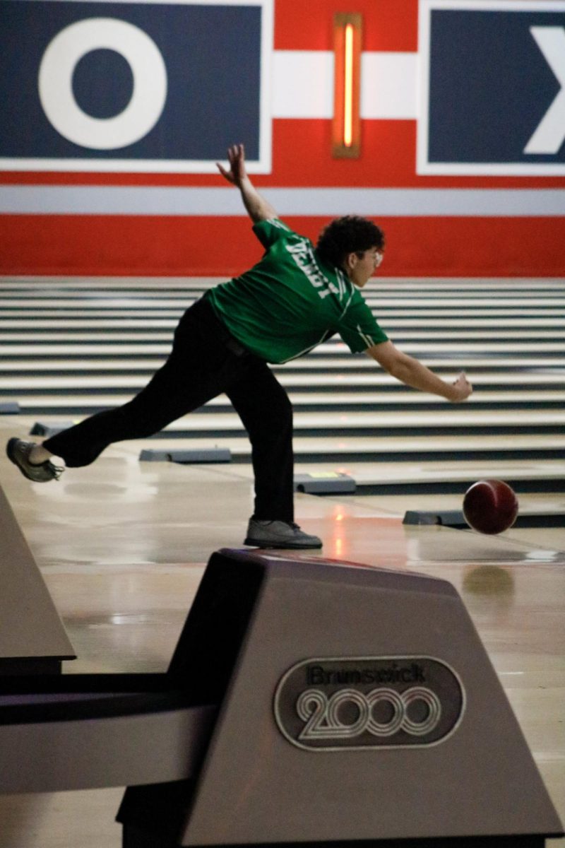 Bowler releasing ball.