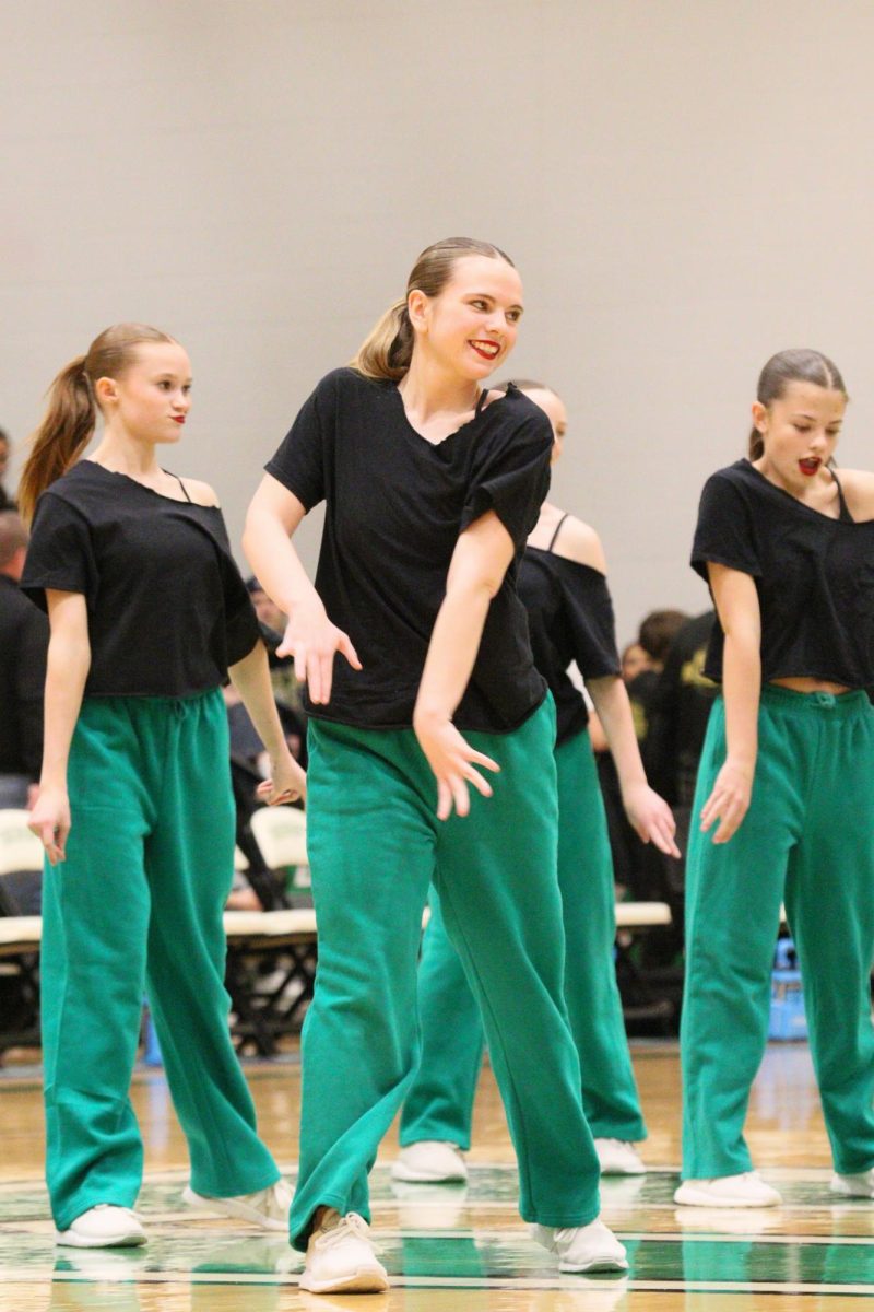 With the dance team competing in Newton on Feb. 21, the dancers perform their hip-hop showcase performance at halftime.