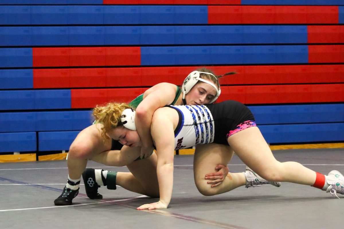 Senior Brooke Downs winning match taking her to state for the fourth time. 