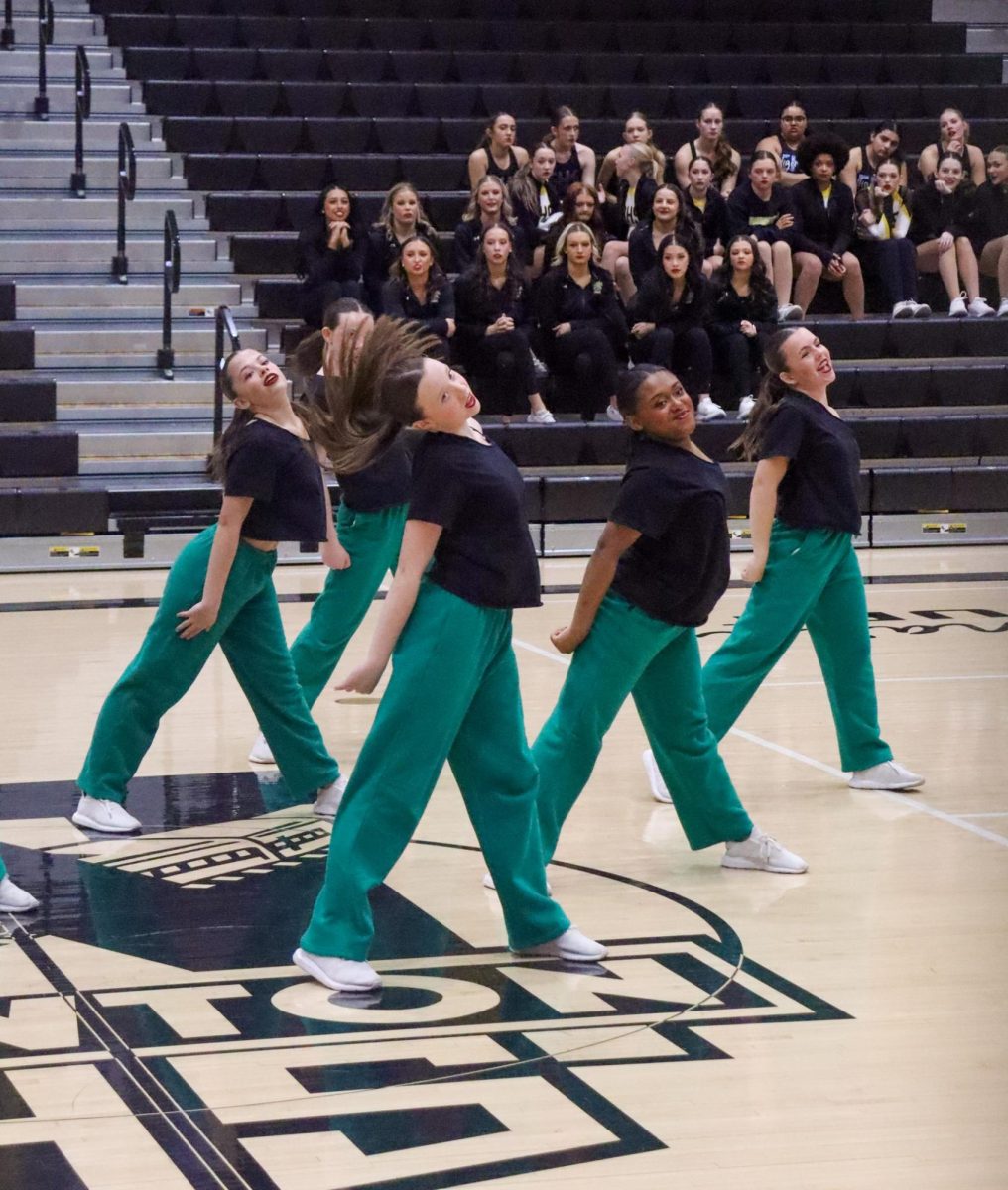 The Derby Pantherettes competed at the Innovative Dance Classic in Newton on Saturday Feb. 21. The team received a Division two rating for their hip hop and a teqiunuq award. For their jazz they received a Division one rating and an entertainment award. Senior Madison Hite and sophomore Breanna Walker preformed a hip hop duet that also received a Division one rating.  