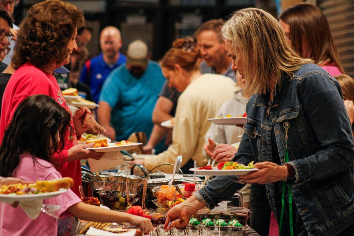 Swim banquet with parents enjoying the food.