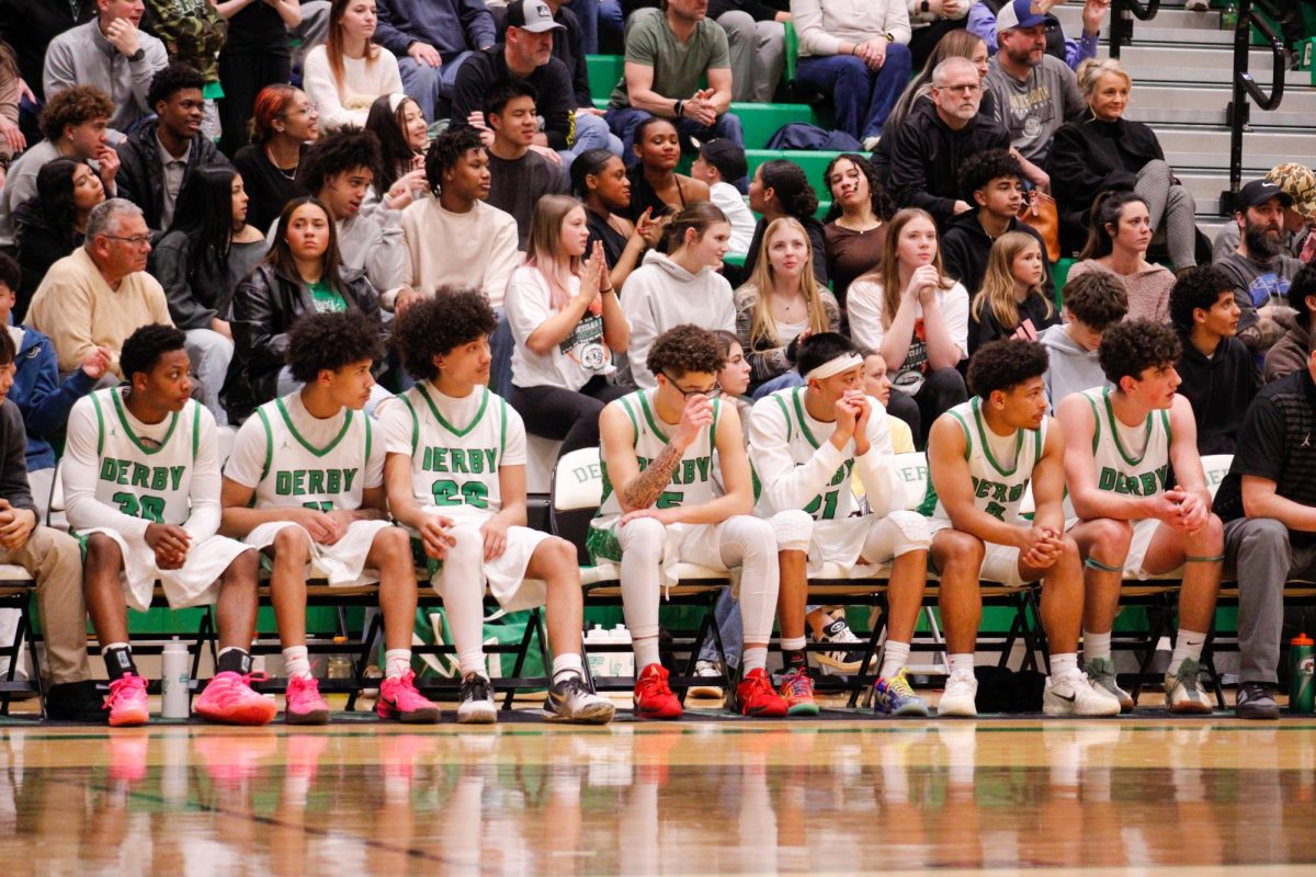 With the support of family, cheer, dance and the band, Derby competes a tough competition against Maize South.