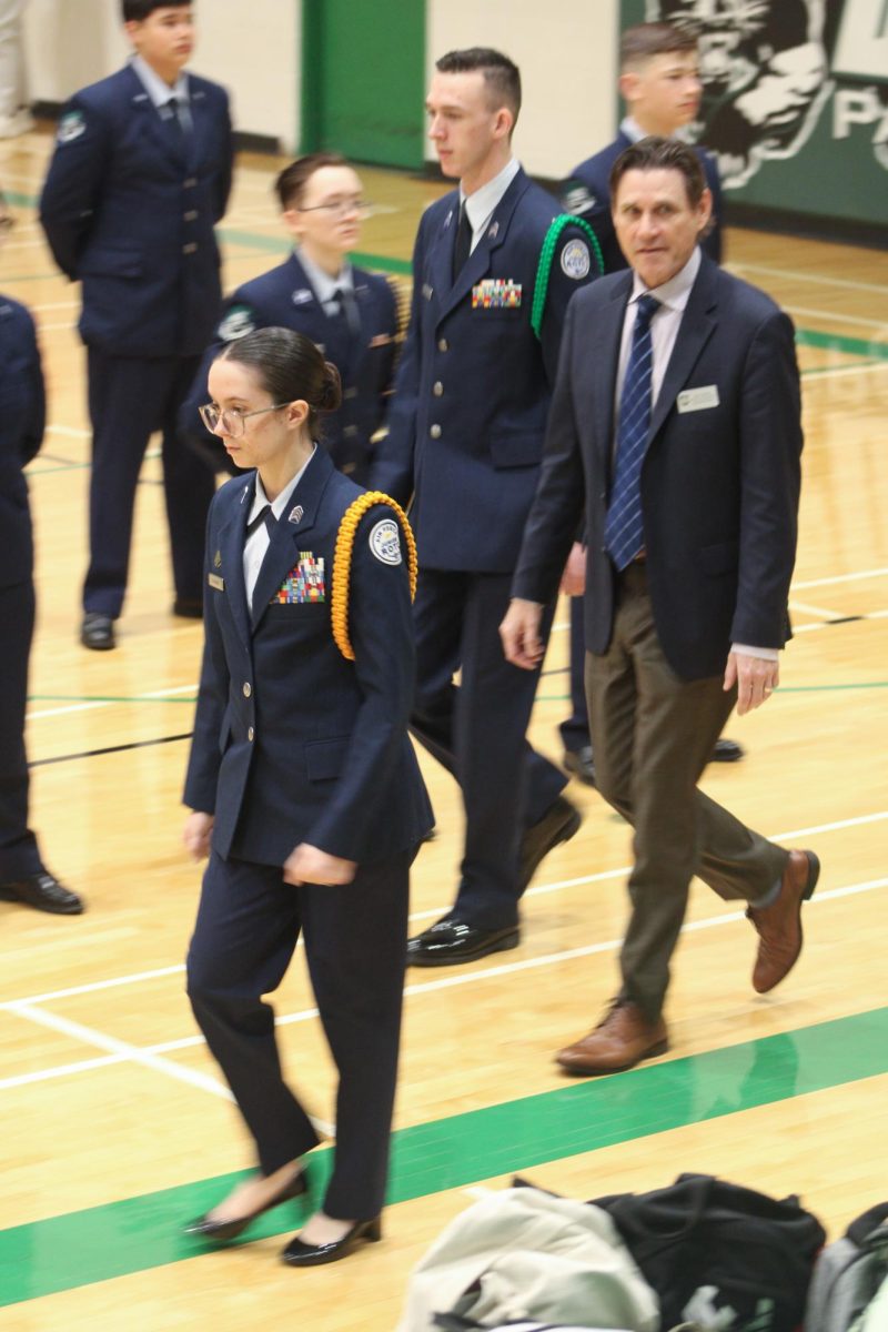 Inspector and Cadets walk back to the front.