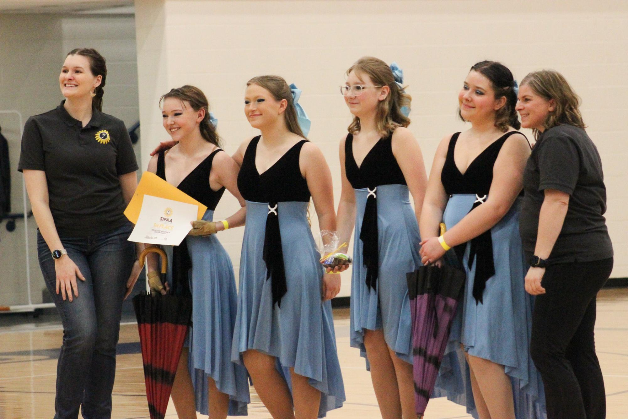 SIPAA ICT winds and winter guard performance (Photos by Bree Stuhlsatz)