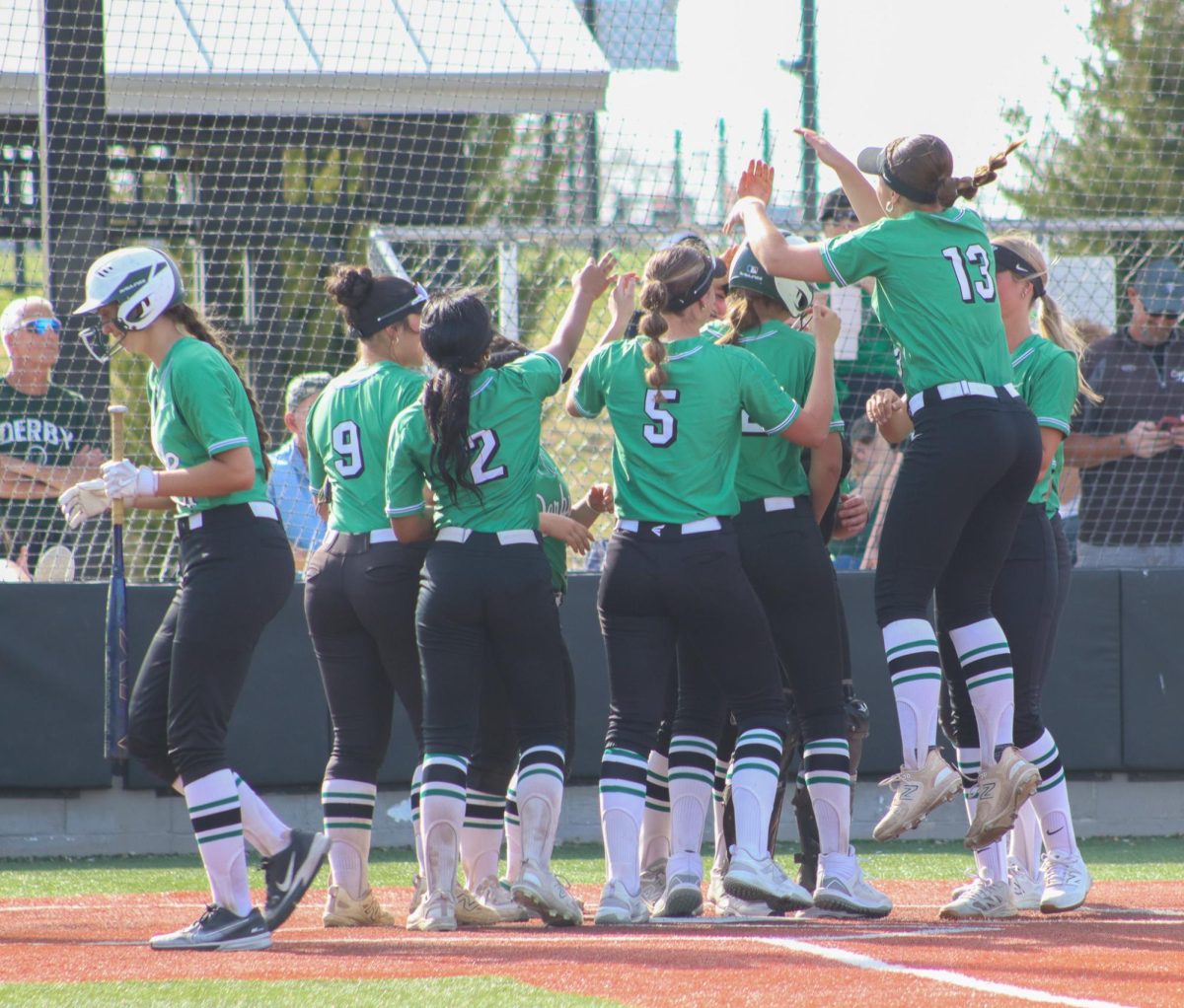 Varsity and JV softball v.s. Newton