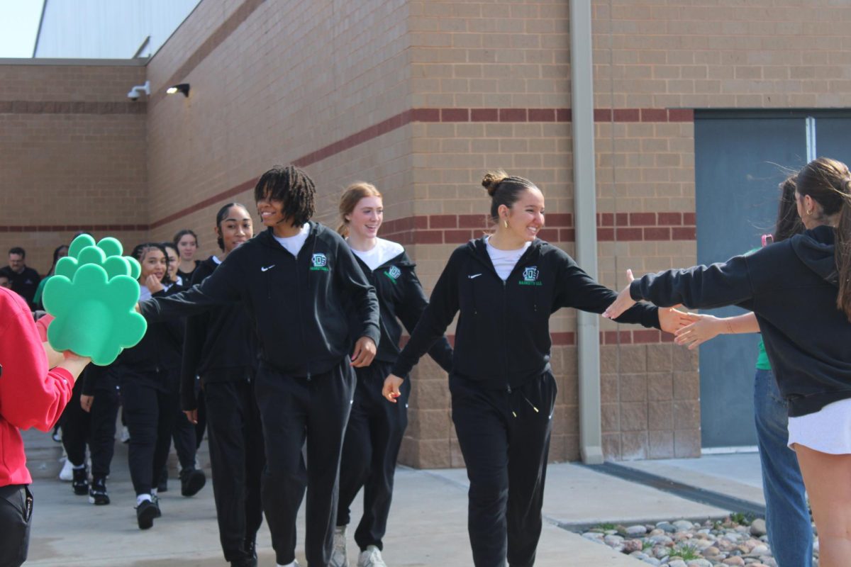 Girls Basketball was sent off to state semi-finals at Koch Arena