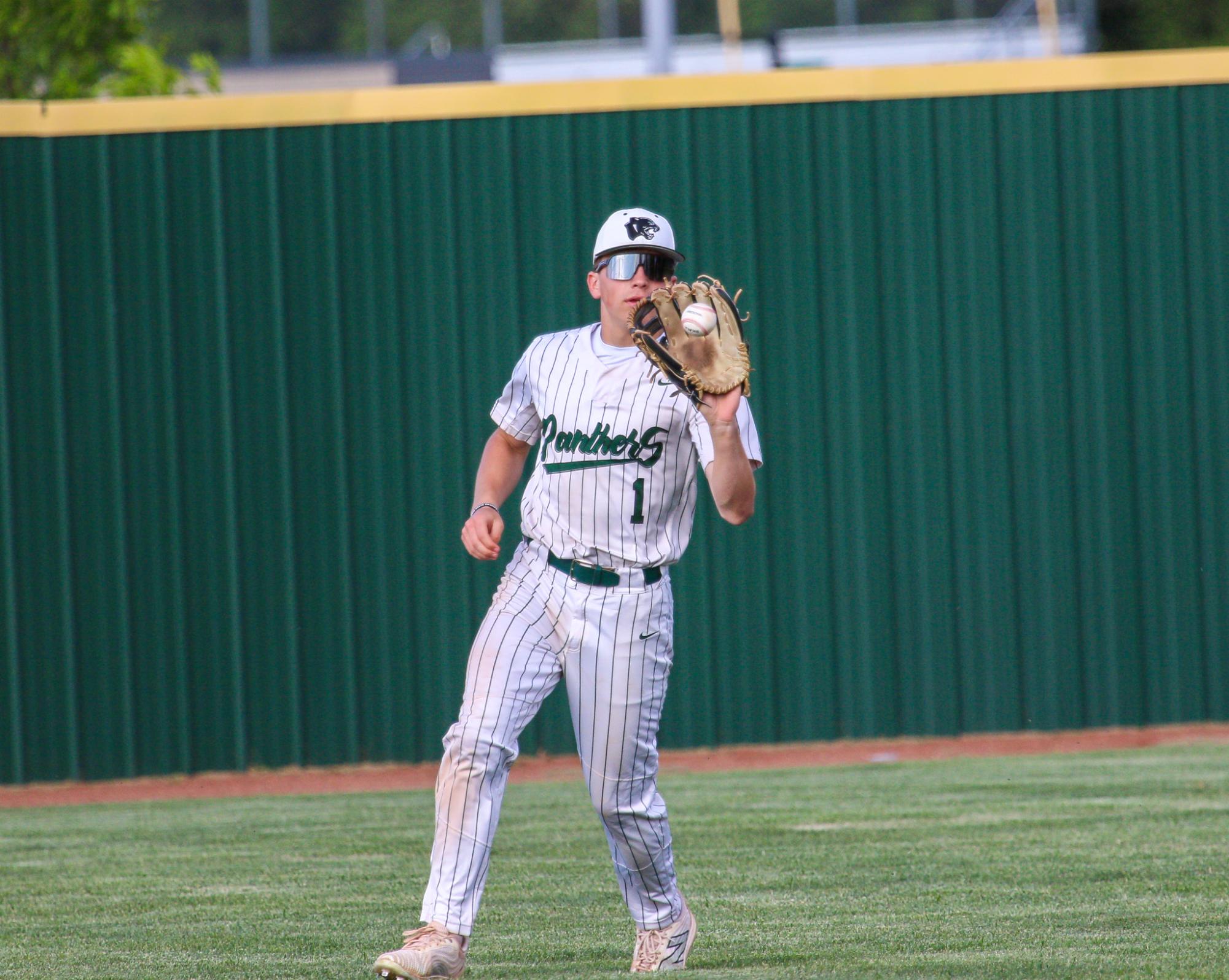 Varsity Baseball vs. Newton (Photos by Bree Stuhlsatz)