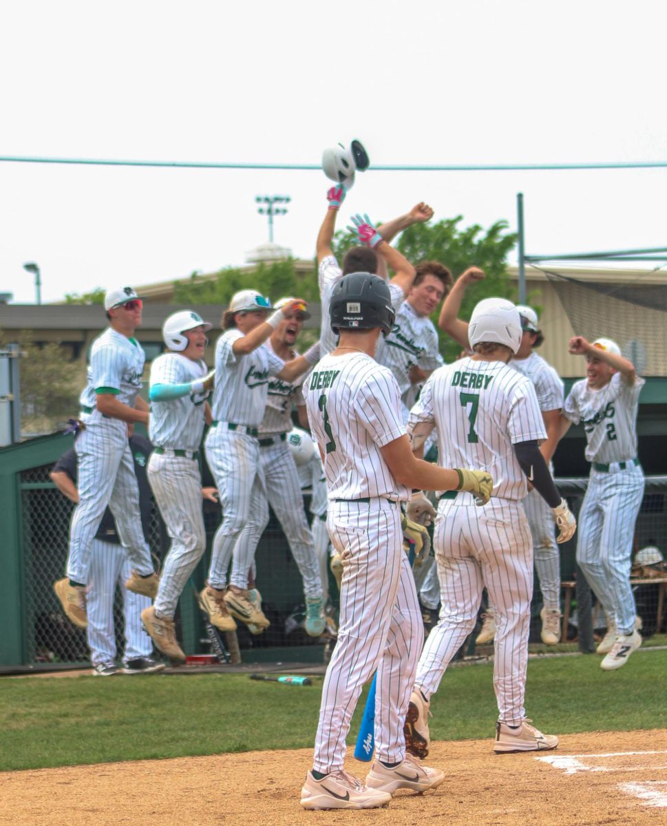 Players celebrate a home run.