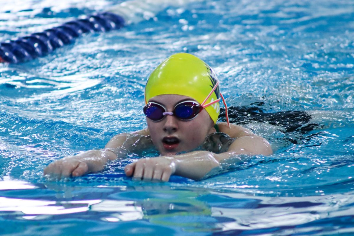 Swimmer trains at the DRC.