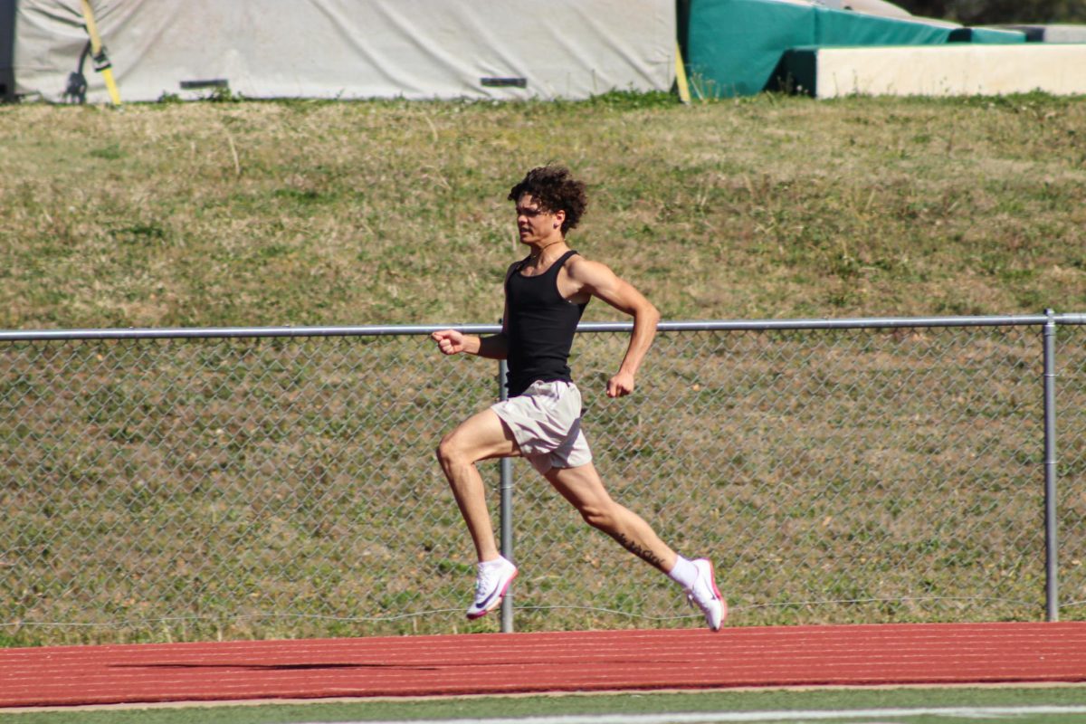 Track player running on the track.