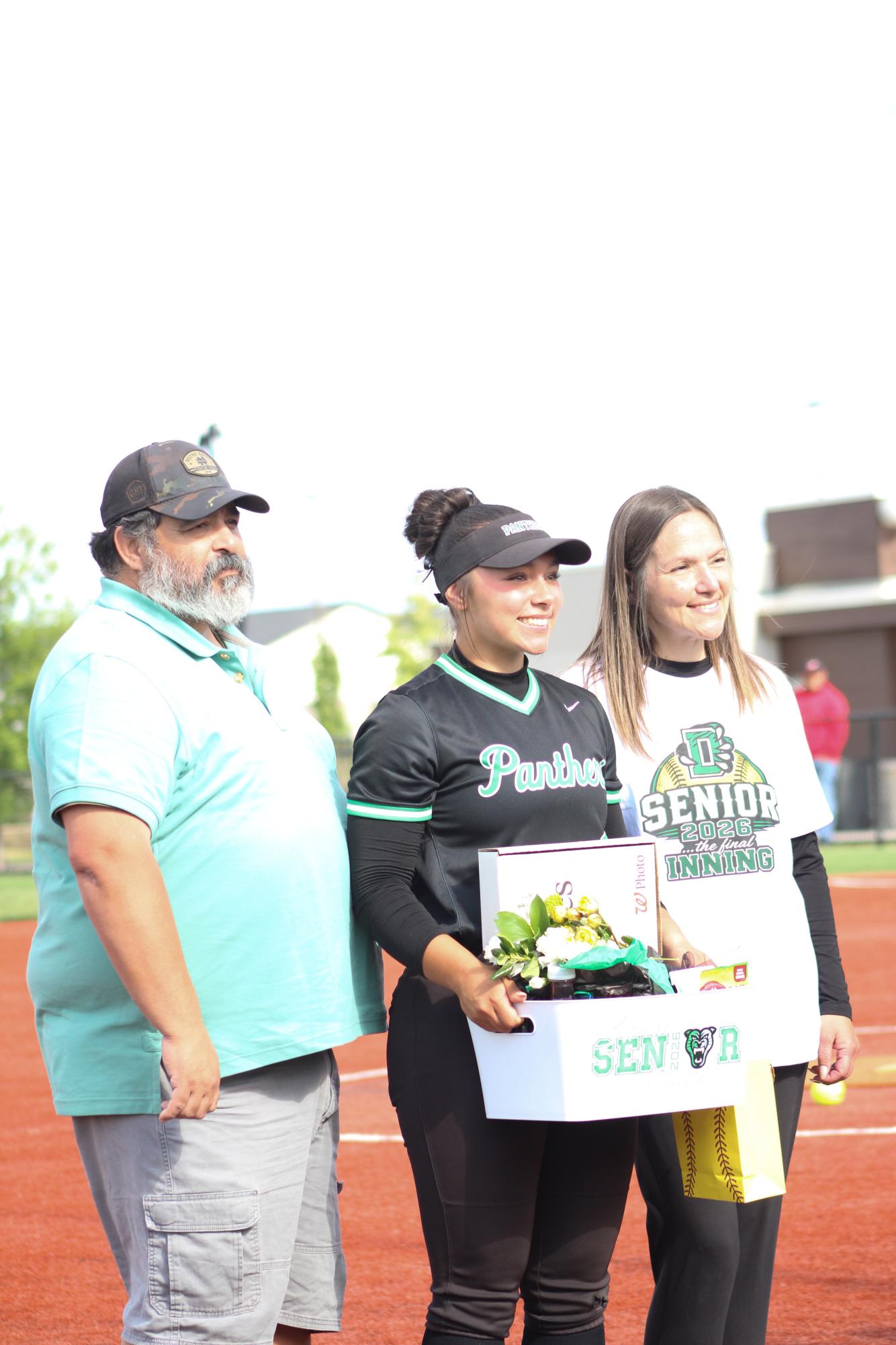 Junior Varsity and Varsity Softball (photos by: Starlan Bryant)