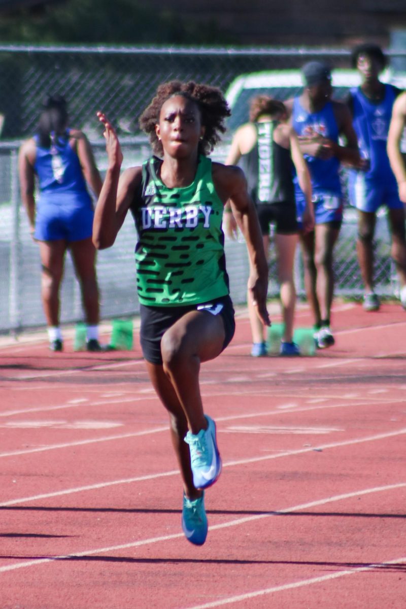 Track athlete races against opponents. 