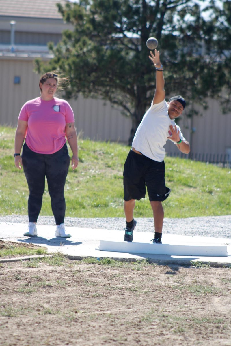Shot-putters throw. 