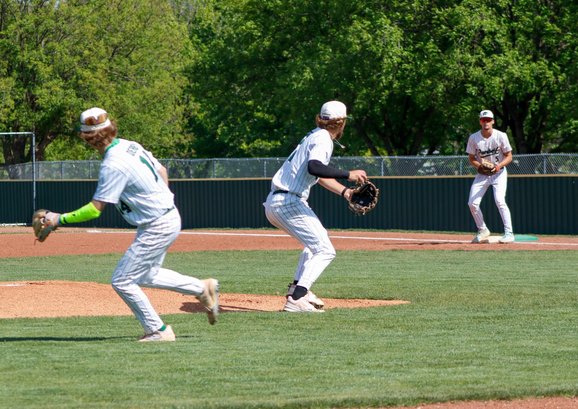 Varsity Baseball vs. Newton ( Photos by Tristan Anderson )