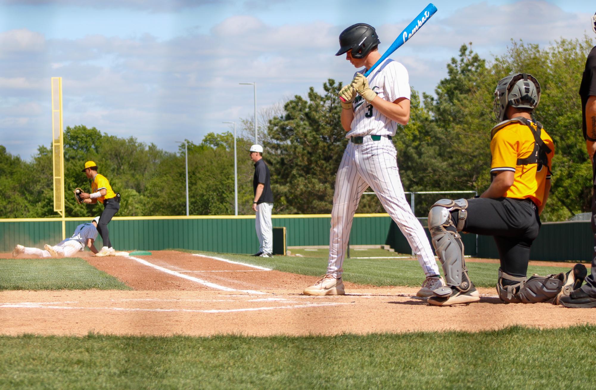 Varsity Baseball vs. Newton ( Photos by Tristan Anderson )