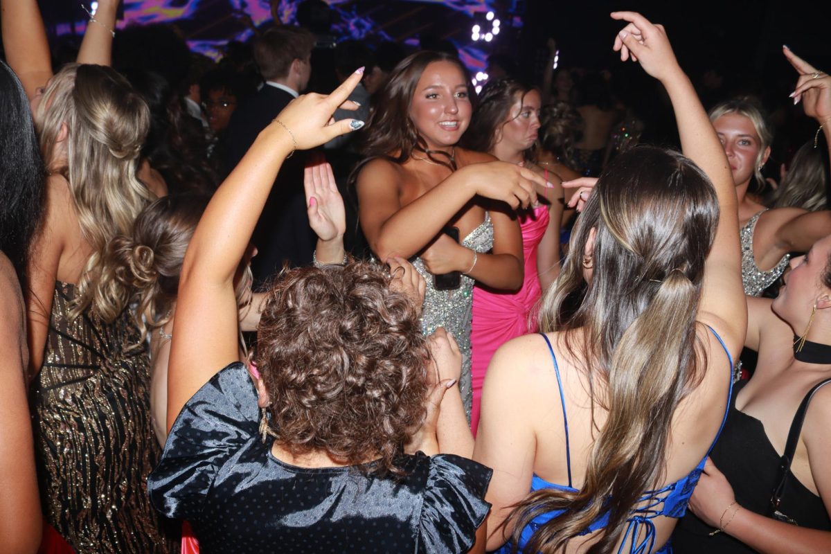 Students dance at prom.