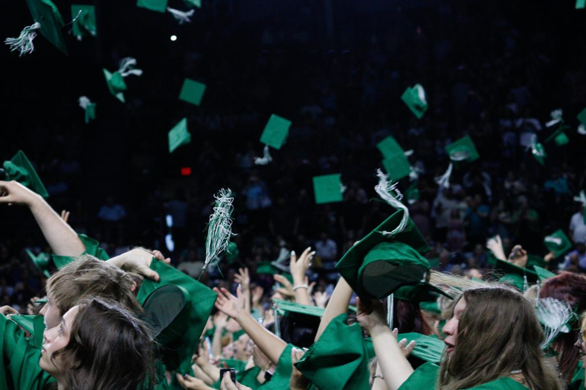Students throwing their caps.
